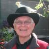 Nick Parker with Bird in Greenhouse